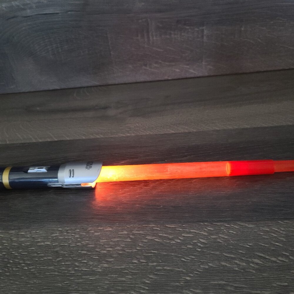 Hasbro Kid's play Star Wars Red Light Saber that lights up.